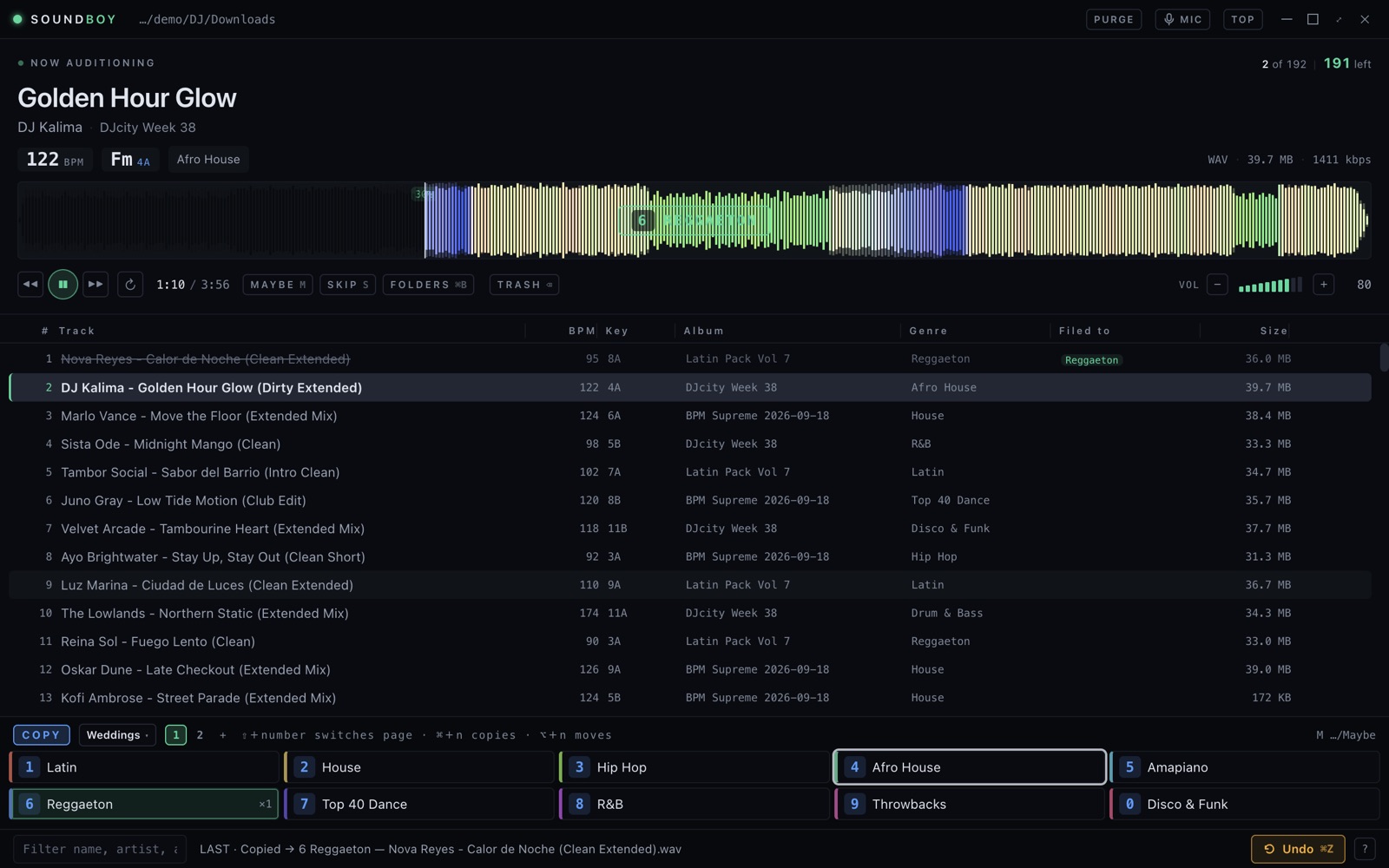 Soundboy just after filing a track: the waveform flashes 6 Reggaeton, the filed track is crossed out in the queue, and the next track is playing